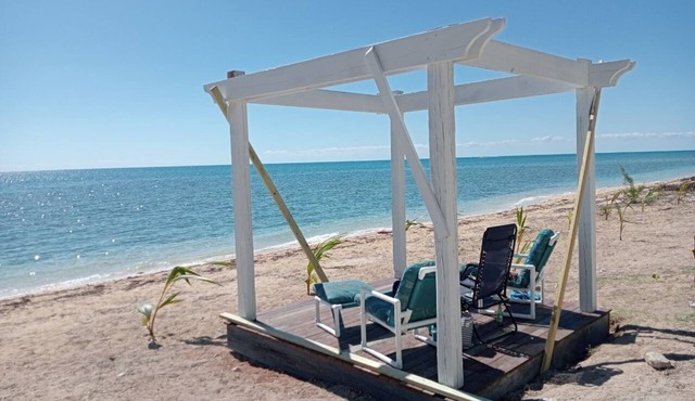 A beautiful apartment on a oceanfront property directly on coral harbour beach.