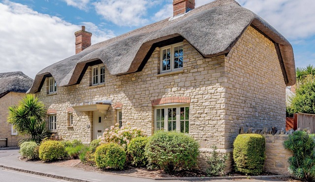 A charming yet contemporary thatched cottage close to Lulworth Cove.