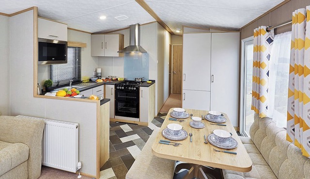 A modern holiday home with one master double and two twin bedrooms.