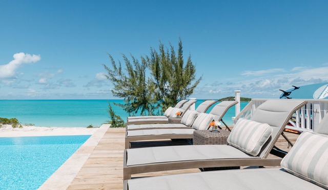 Beachfront Villa with Pool & Sandy Beach All Year Round