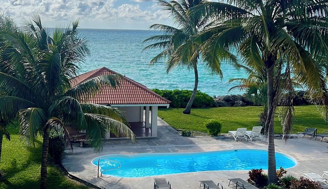 Beachfront 2BR Coastal Townhouse with Pool, Ocean Views & Beach Access