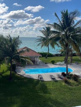 Beachfront 2BR Townhouse with Pool & Ocean View