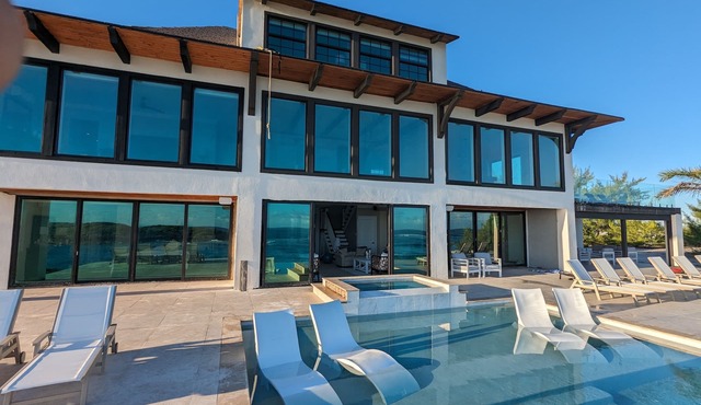 Beachfront estate home with private 70’ dock and 7500sq ft. of living space