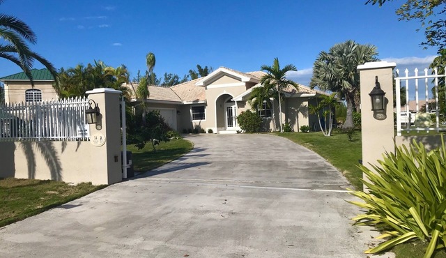 Beautiful Canal Front Gated Property With Pool!