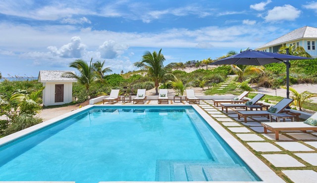 Brand New Villa on Pink-Sand Beachfront Estate with Shared Pool