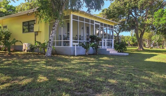 Buttercup Family Cottage beautiful beach, great snorkeling spot across the road