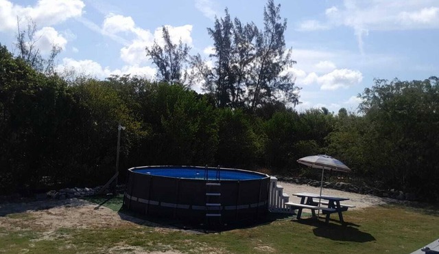 Centrally located family oriented near grocery store, airport, and beach