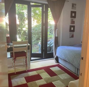 Charming Bedroom with Garden