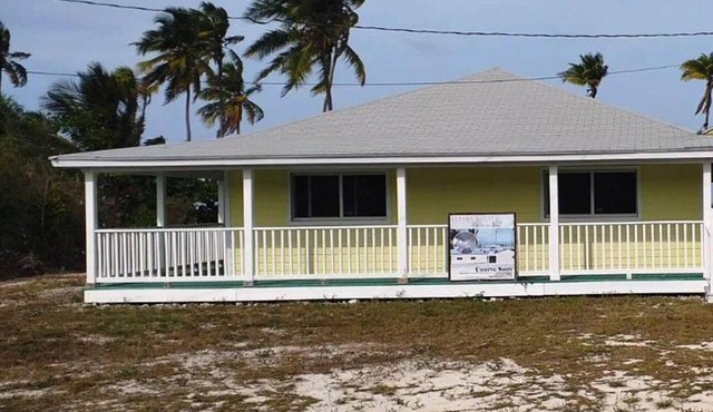 Cheerful one bedroom villa with a patio.