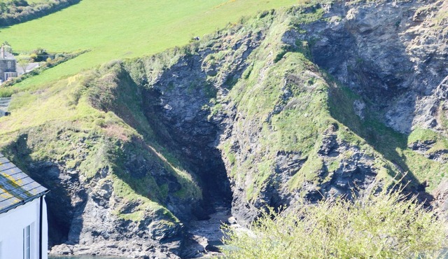Cliff and sea views from this family cottage, only 200 yards from the harbour.