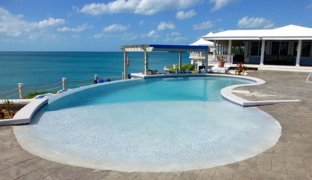 Cliff-Top Estate with Pool, Sunsets, Direct Caribbean Access, Walk to Rest./Bar!