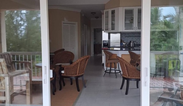 Coral Condominium - Tranquil 2-bedroom right on our private beach.