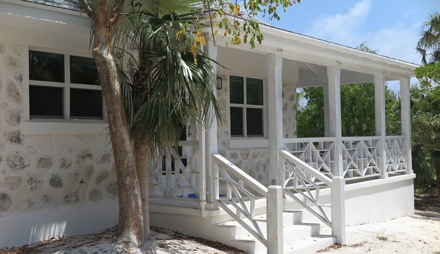 Cozy stone studio cottage on private pink sand beach