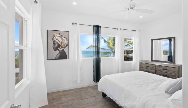 Cozy two-bedroom two bathroom on white sandy beach