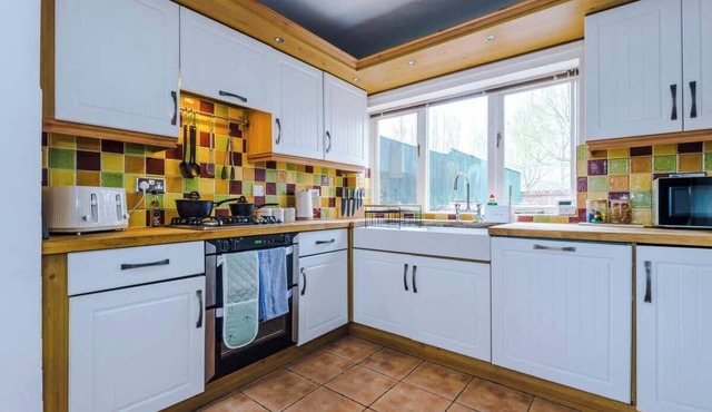 Delightful 3 bedroom home with parking and garden