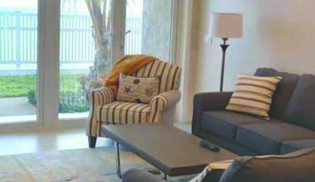 Detach & Unwind at this Beachside Condo. Literally steps away from the beach!