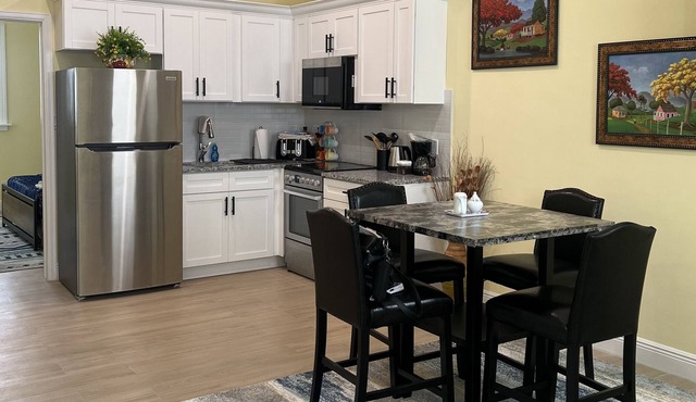 Elegant, pristine, secure, 1 bedroom 1.5 bath, near the beach and supermarket.