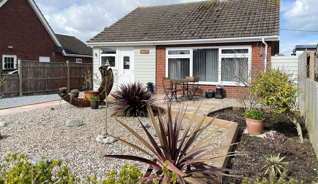 Enjoy the seaside with just a short walk to a wonderful, sandy beach.