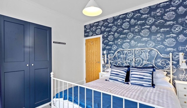 Garden apartment with parking seconds from beach!