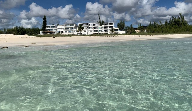 Ground floor condo with private beach. Pet friendly