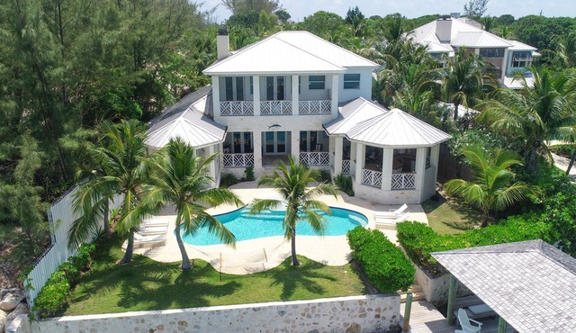Harbor Island Oceanfront Escape. Private Dock, Heated Pool & Sunset Views.