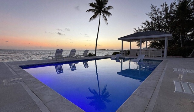 Island Time - Brand New 4 bedroom Luxury house right on the Beach!