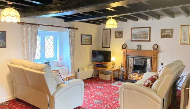 Lake District oak-beamed cottage.Pet welcome. Summer heated outdoor pool.