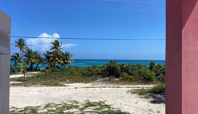 Located in Greenwood Estates, Port Howe on Cat Island. Battery backup system!