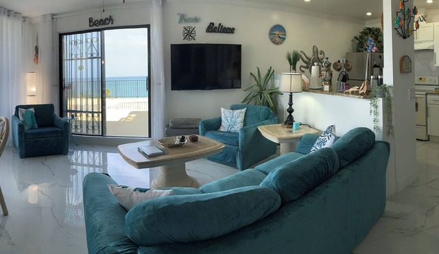 Luxurious Beachfront Condo with Breath Taking Ocean, Beach and Garden Views.