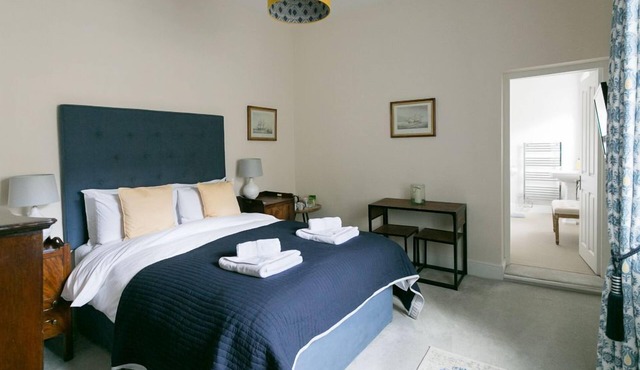 Luxury King bedroom with ensuite bathroom in a wing of a private Country House
