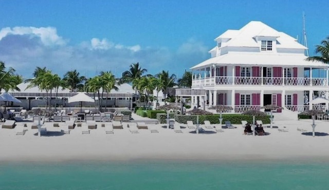 Luxury townhouse in gated community steps away from the beach and pool