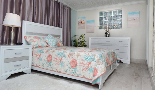 Miss Annie, Cocoplum Cottage