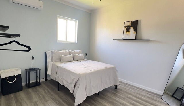 Modern 1 bed 1 bath with a study/office steps away from the beach near Bahamar