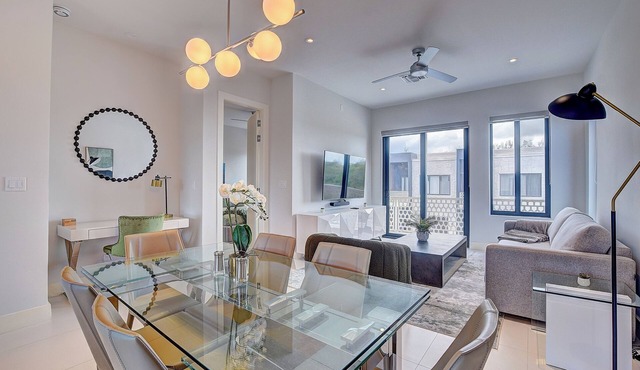 Modern condo in gated community. Steps to beach.