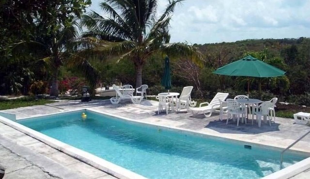 On hilltop with pool. Only 400 feet down to waterfront, dock & kayaks.