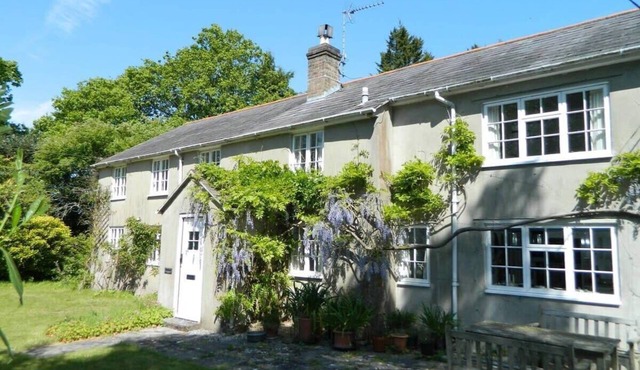 River Cottage a country retreat in wooded gardens