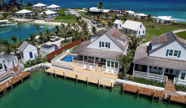 South End Villa on the Water: Lovely Pool, Expansive Decks, and 60’ Private Dock