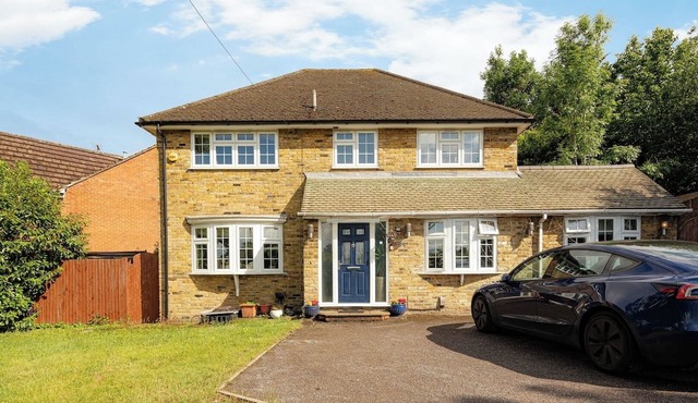 Spacious 4BR Home with Garden and Parking
