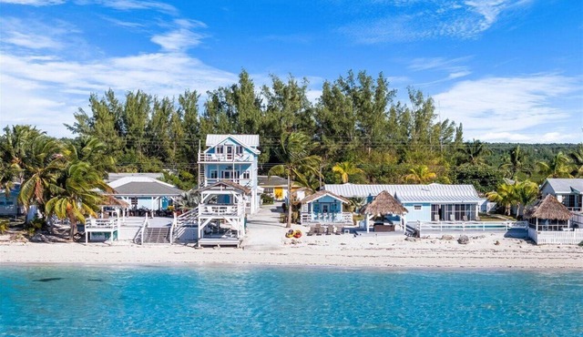 The Paradise. Beachfront property with a pool; accommodates 14 guests.
