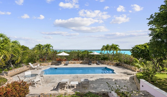 The Pink House vacation rental, magnificent pool and view over Elizabeth harbor