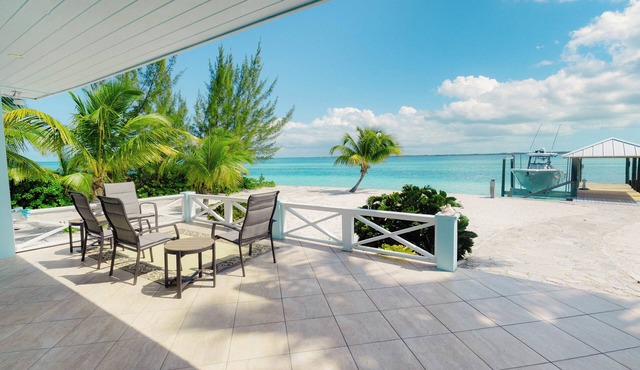 Tranquil 4-bedroom 3-bath house with 50' boat dock in delightful Treasure Cay