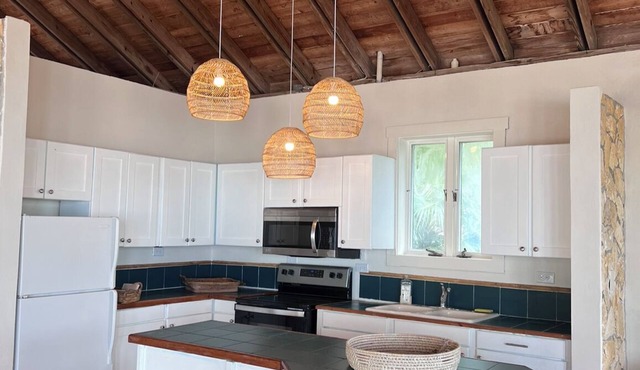 Two villas on a white sandy beach of Fernandez Bay