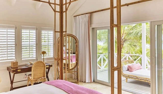 Unwind in a Stylish Villa Overlooking Pink Sand Paradise & Turquoise Waters