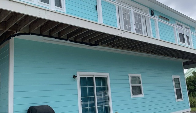 Upstairs 3 BR, 2 bath home, 150 yds from beach with beautiful clear water.