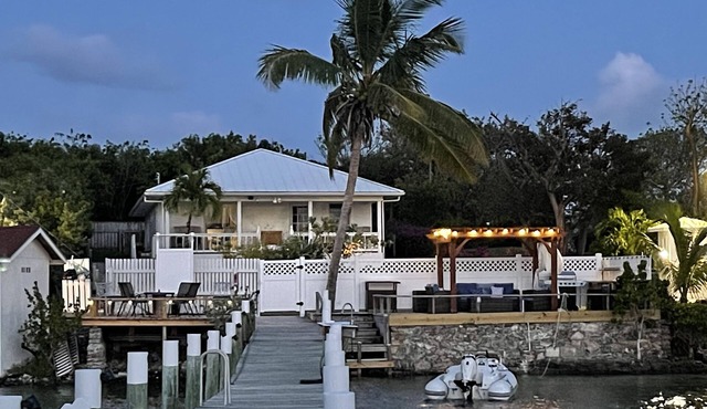 Waterfront Beach Bungalow with 150 Foot Dock on Guana Cay and Waterside Pergola