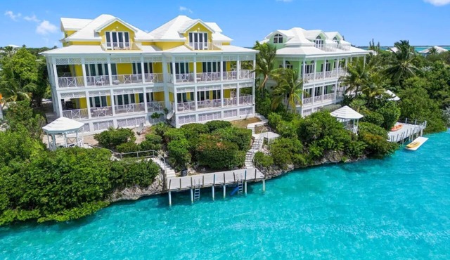 Waterfront Villa with Dock, Walk to Beach Club & Rusty Anchor Rest. 3b/r 3.5b/a